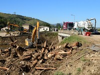 Several volunteers and residents participate in the restoration of the village of Limony in Ardeche, France, on October 21, 2024, after the...