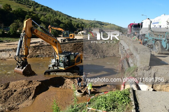 Several volunteers and residents participate in the restoration of the village of Limony in Ardeche, France, on October 21, 2024, after the...