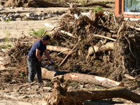 Several volunteers and residents participate in the restoration of the village of Limony in Ardeche, France, on October 21, 2024, after the...