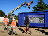 Several volunteers and residents participate in the restoration of the village of Limony in Ardeche, France, on October 21, 2024, after the...