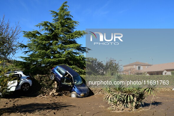 Several volunteers and residents participate in the restoration of the village of Limony in Ardeche, France, on October 21, 2024, after the...