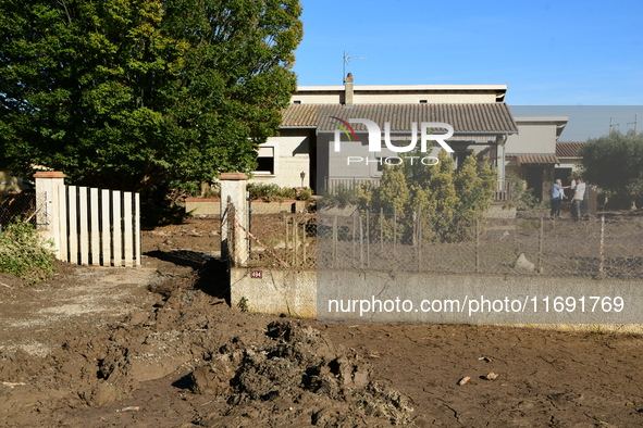 Several volunteers and residents participate in the restoration of the village of Limony in Ardeche, France, on October 21, 2024, after the...