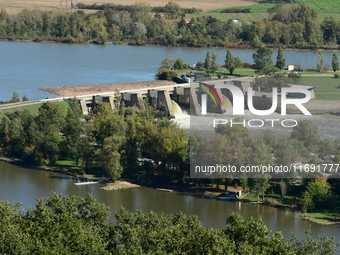 An aerial view shows the Rhone and the Saint Pierre de Boeuf hydraulic dam in the Loire after the floods on October 21, 2024. (