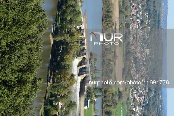 An aerial view shows the Rhone and the Saint Pierre de Boeuf hydraulic dam in the Loire after the floods on October 21, 2024. 