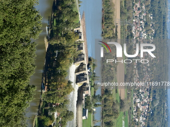 An aerial view shows the Rhone and the Saint Pierre de Boeuf hydraulic dam in the Loire after the floods on October 21, 2024. (