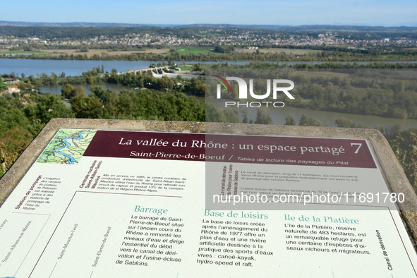 An aerial view shows the Rhone and the Saint Pierre de Boeuf hydraulic dam in the Loire after the floods on October 21, 2024. 