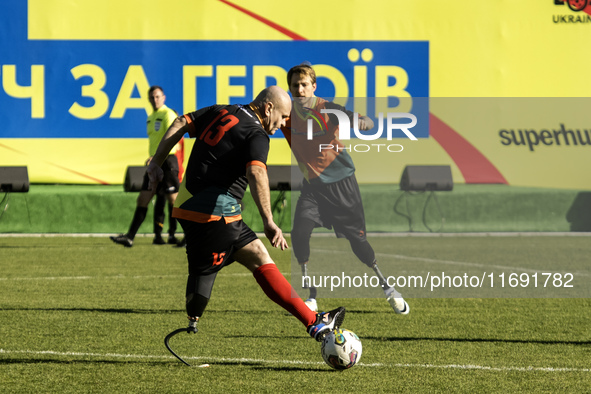 A football match takes place in Kyiv, Ukraine, on October 20, 2024, with the participation of veterans of the Russian-Ukrainian war, patient...