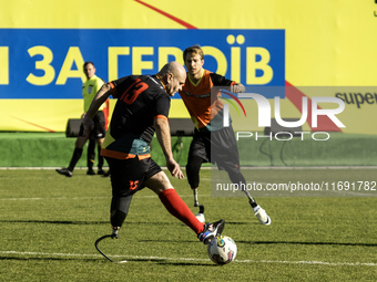 A football match takes place in Kyiv, Ukraine, on October 20, 2024, with the participation of veterans of the Russian-Ukrainian war, patient...