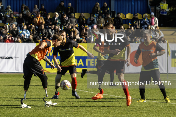 A football match takes place in Kyiv, Ukraine, on October 20, 2024, with the participation of veterans of the Russian-Ukrainian war, patient...