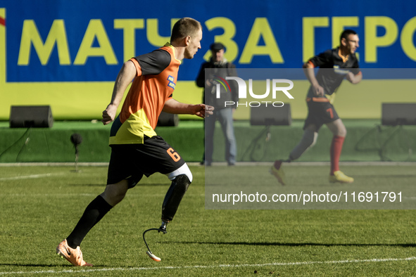 A football match takes place in Kyiv, Ukraine, on October 20, 2024, with the participation of veterans of the Russian-Ukrainian war, patient...