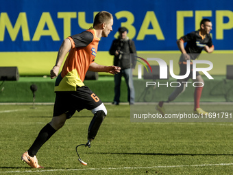 A football match takes place in Kyiv, Ukraine, on October 20, 2024, with the participation of veterans of the Russian-Ukrainian war, patient...