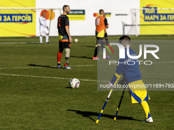 A football match takes place in Kyiv, Ukraine, on October 20, 2024, with the participation of veterans of the Russian-Ukrainian war, patient...