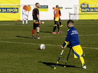 A football match takes place in Kyiv, Ukraine, on October 20, 2024, with the participation of veterans of the Russian-Ukrainian war, patient...