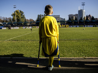 A football match takes place in Kyiv, Ukraine, on October 20, 2024, with the participation of veterans of the Russian-Ukrainian war, patient...