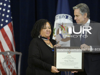 US State Department Secretary Antony Blinken awards Afro-Mexican feminist Tanya Duarte during a Secretary of State's Award for Global Anti-R...