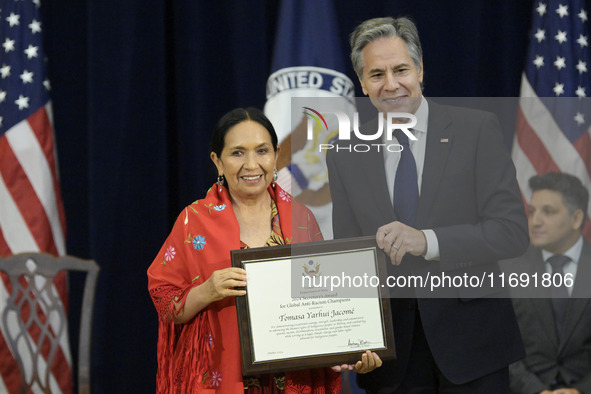 US State Department Secretary Antony Blinken awards Bolivian Political Leader Tomasa Yarhui Jacom during a Secretary of State's Award for Gl...