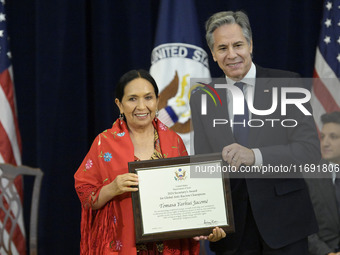 US State Department Secretary Antony Blinken awards Bolivian Political Leader Tomasa Yarhui Jacom during a Secretary of State's Award for Gl...