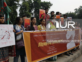 Students take part in a protest against recent child rape, demanding justice and punishment in all rape cases in Dhaka, Bangladesh, on Octob...