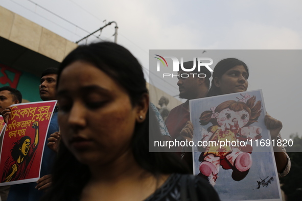 Students take part in a protest against recent child rape, demanding justice and punishment in all rape cases in Dhaka, Bangladesh, on Octob...