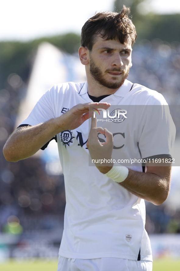 Napoli's Khvicha Kvaratskhelia celebrates after scoring their first goal during the Serie A soccer match between Empoli FC and SSC Napoli at...