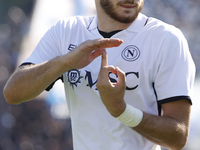 Napoli's Khvicha Kvaratskhelia celebrates after scoring their first goal during the Serie A soccer match between Empoli FC and SSC Napoli at...