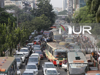 People are stuck in a traffic jam in Dhaka, Bangladesh, on October 21, 2024. (