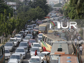 People are stuck in a traffic jam in Dhaka, Bangladesh, on October 21, 2024. (