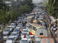 People are stuck in a traffic jam in Dhaka, Bangladesh, on October 21, 2024. (