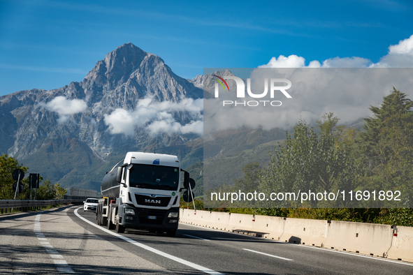 Vehicles crossing A24 highway are seen in the province of Teramo, Italy, on October 12th, 2024. Gran Sasso peaks (Corno Grande and Corno Pic...