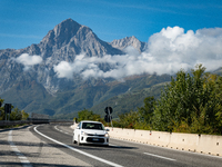 A vehicle crossing A24 highway are seen in the province of Teramo, Italy, on October 12th, 2024. Gran Sasso peaks (Corno Grande and Corno Pi...