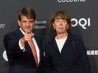 Henriette Reker, the mayor of Cologne, and Leopold Hoesch, the film producer, are seen on the red carpet during the photocall of ''Die Unbeu...