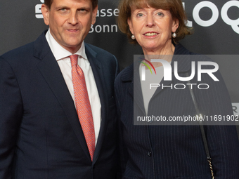 Henriette Reker, the mayor of Cologne, and Leopold Hoesch, the film producer, are seen on the red carpet during the photocall of ''Die Unbeu...