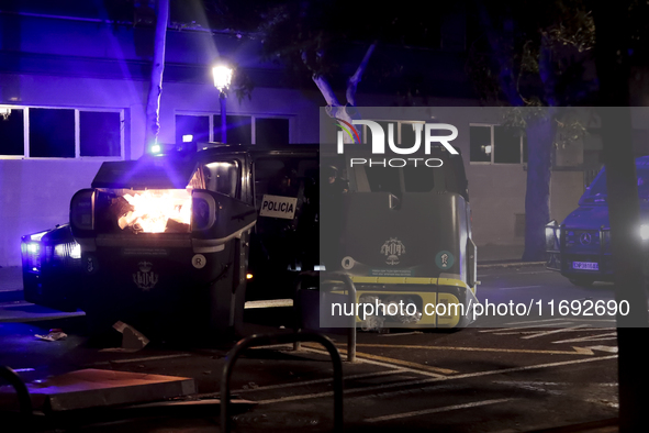 Several Valencia CF ultras confront the police by throwing objects and burning rubbish containers after losing against UD Las Palmas in a La...