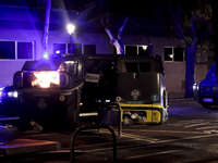 Several Valencia CF ultras confront the police by throwing objects and burning rubbish containers after losing against UD Las Palmas in a La...