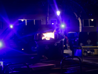 Several Valencia CF ultras confront the police by throwing objects and burning rubbish containers after losing against UD Las Palmas in a La...