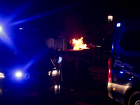 Several Valencia CF ultras confront the police by throwing objects and burning rubbish containers after losing against UD Las Palmas in a La...