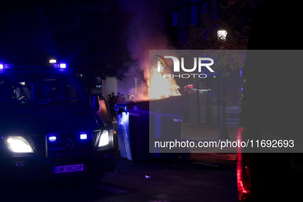 Several Valencia CF ultras confront the police by throwing objects and burning rubbish containers after losing against UD Las Palmas in a La...