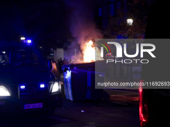 Several Valencia CF ultras confront the police by throwing objects and burning rubbish containers after losing against UD Las Palmas in a La...