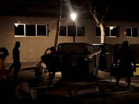 Several Valencia CF ultras confront the police by throwing objects and burning rubbish containers after losing against UD Las Palmas in a La...