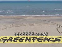 Greenpeace volunteers work on the beach with the students of the Fermi-Nervi-Cassandro Institute to say stop to single-use plastic in Barlet...