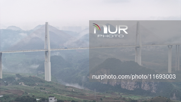 A photo taken on October 22, 2024, shows the scenery of Malinghe River Bridge in Xingyi, China, on October 22, 2024. 