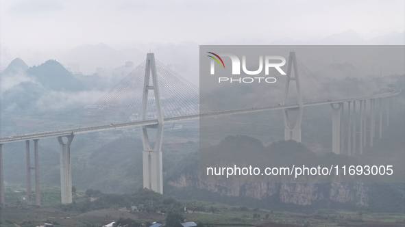 A photo taken on October 22, 2024, shows the scenery of Malinghe River Bridge in Xingyi, China, on October 22, 2024. 