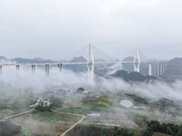 A photo taken on October 22, 2024, shows the scenery of Malinghe River Bridge in Xingyi, China, on October 22, 2024. (