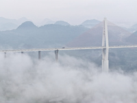 A photo taken on October 22, 2024, shows the scenery of Malinghe River Bridge in Xingyi, China, on October 22, 2024. (