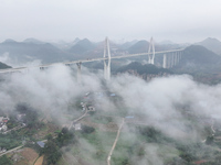 A photo taken on October 22, 2024, shows the scenery of Malinghe River Bridge in Xingyi, China, on October 22, 2024. (