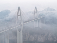 A photo taken on October 22, 2024, shows the scenery of Malinghe River Bridge in Xingyi, China, on October 22, 2024. (