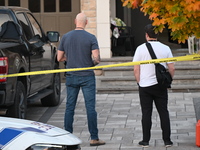 Investigators from the Peel Regional Police search for evidence at the scene of a home invasion in Brampton, Canada, on October 21, 2024. On...