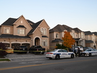 Investigators from the Peel Regional Police search for evidence at the scene of a home invasion in Brampton, Canada, on October 21, 2024. On...