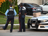 Investigators from the Peel Regional Police search for evidence at the scene of a home invasion in Brampton, Canada, on October 21, 2024. On...