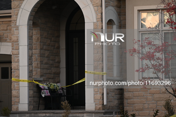 Investigators from the Peel Regional Police search for evidence at the scene of a home invasion in Brampton, Canada, on October 21, 2024. On...